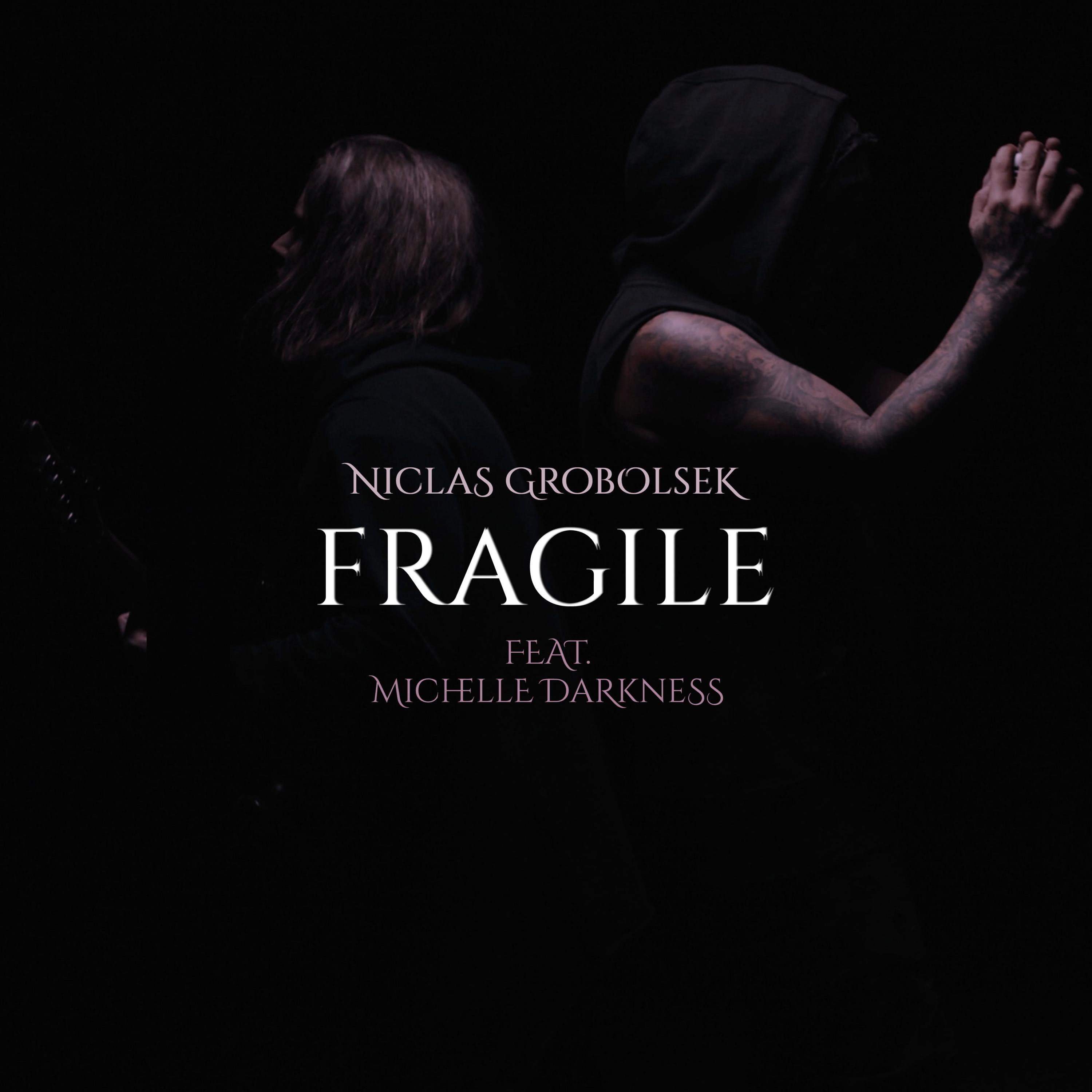 Fragile (feat. Michelle Darkness)