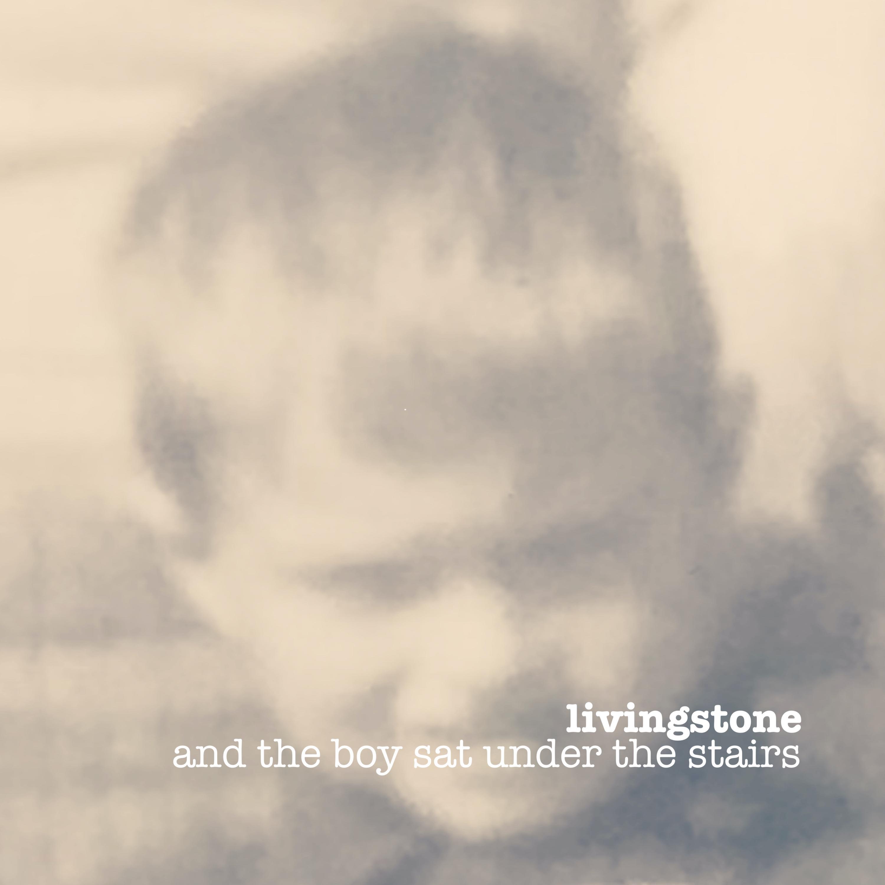 and the boy sat under the stairs