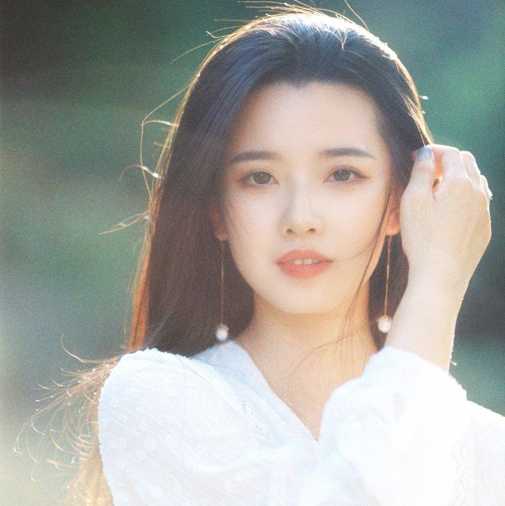 把时间光怪陆离都经历 把你放心底