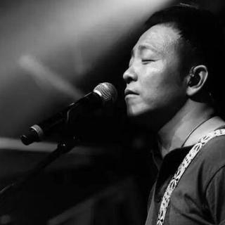 一把吉他一首老许