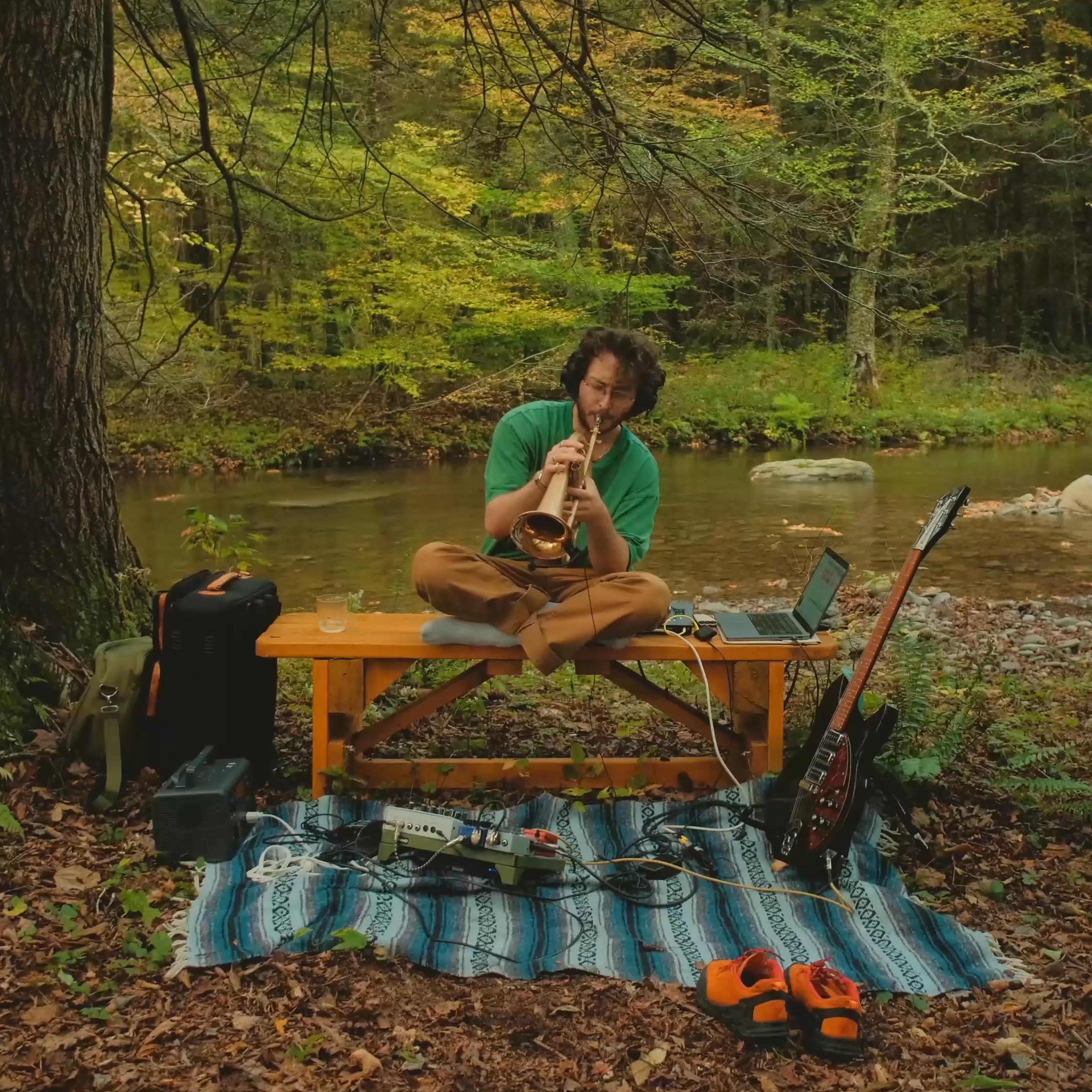 on a small boat at sunset floating on a crystal-clear lake